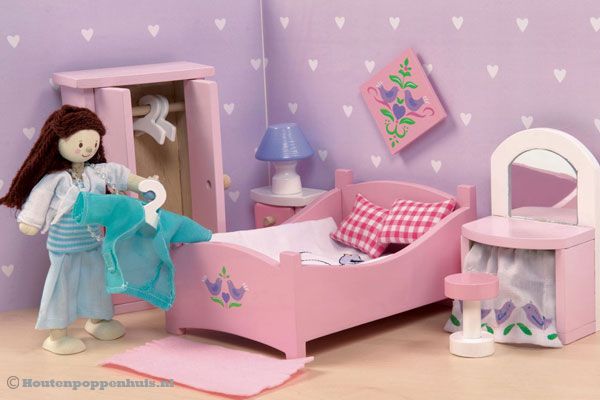 Staat prachtig in een houten poppenhuis!